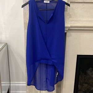 Royal Blue high low criss cross tank blouse. One size small/medium. Worn once.